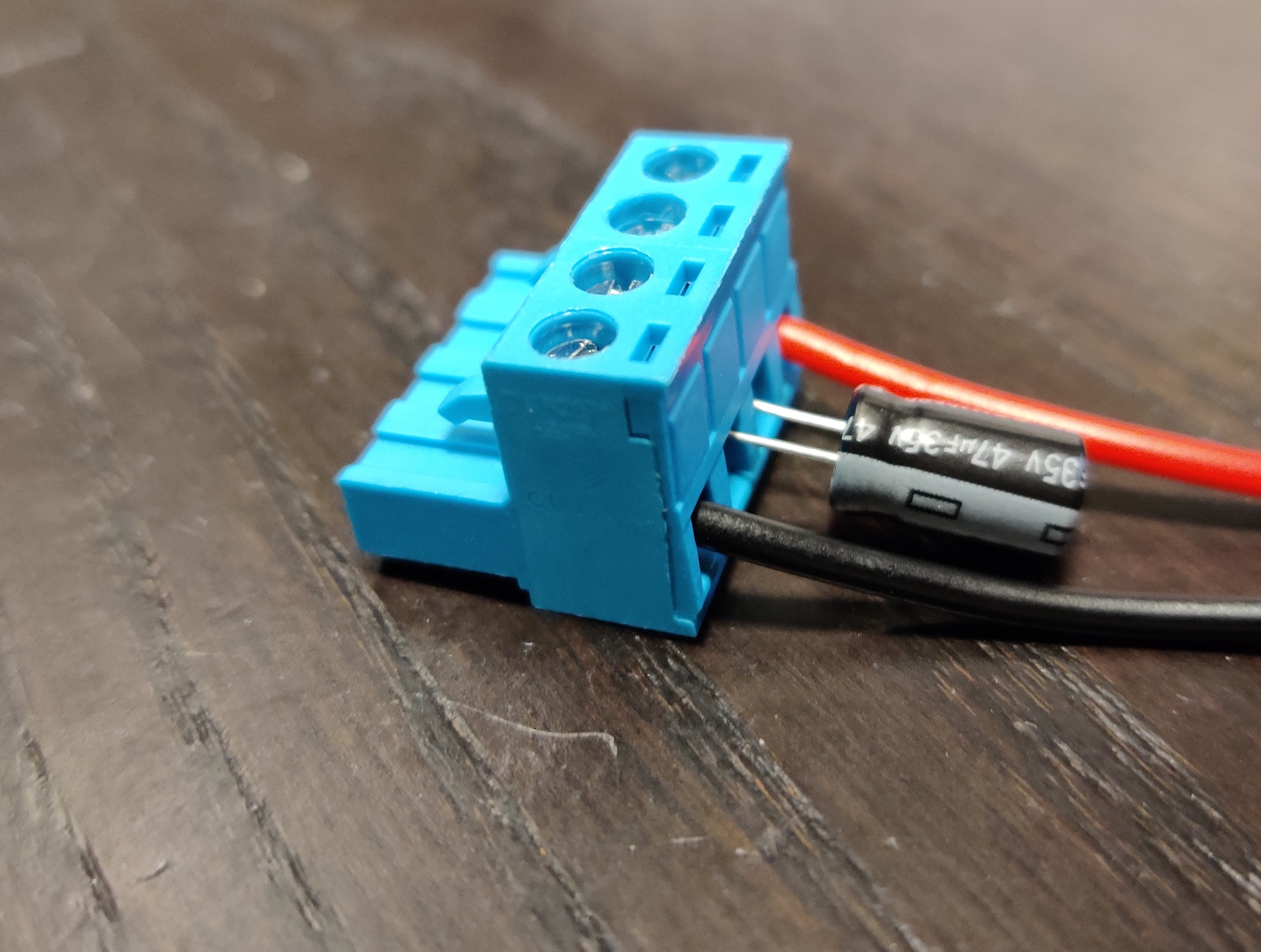 Connector with capacitor